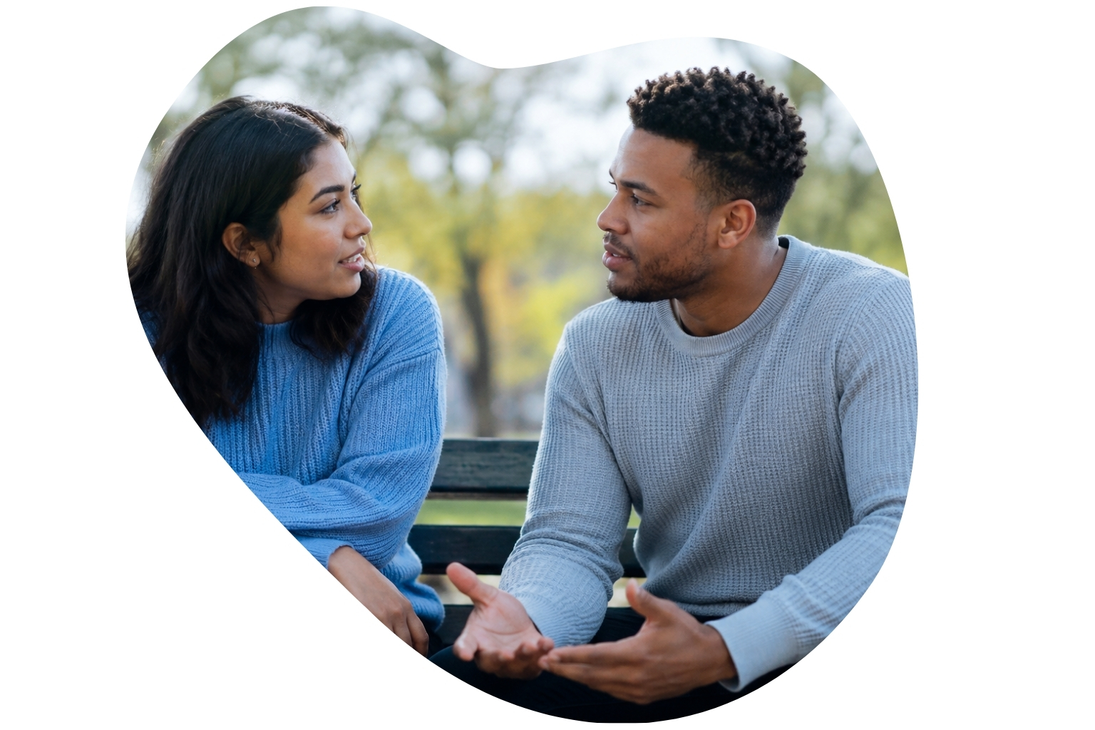 Image: Couple having an open conversation in a park