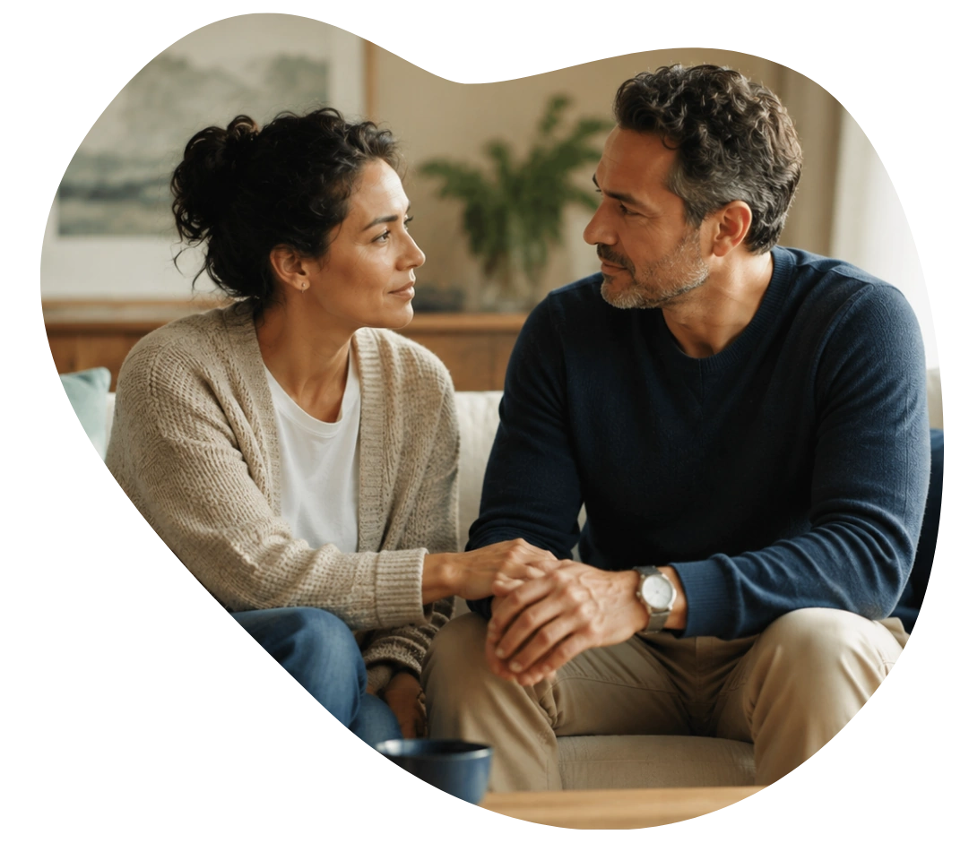 A couple gently reconnecting after a calm and honest conversation.
